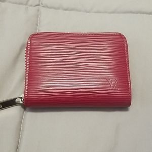 Authentic Louis Vuitton zip around wallet.